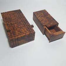 Maybe you would like to learn more about one of these? Two Difficult Puzzle Boxes With Different Ways To Open Handmade From Thuya Wood By Moroccan Artisans Wood Puzzle Box Puzzle Box Wooden Puzzle Box