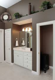 Decorating a high shelf can seem like a challenge to some homeowners, especially depending on the location and size of the shelf. 20 Best High Shelf Decorating Ideas Above Cabinet Decor Above Kitchen Cabinets High Shelf Decorating