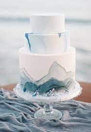 Chic Beach Wedding Cake Ideas For Your Seaside Soiree Beach Theme Wedding Cakes Wedding Cake Toppers Themed Wedding Cakes
