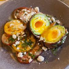 Estrella S Rolling Stone A Poached Egg Stuffed Avocado Wrapped In Bacon Food Bacon Wrapped Healthy Dinner Recipes Easy