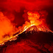 People watch as lava flows from an eruption from the fagradalsfjall volcano on the reykjanes peninsula in southwestern iceland on tuesday, may 11, 2021. Volcanology And The Study Of Deadly Volcanoes Latest Science News And Articles Discovery
