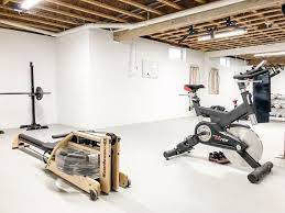 How To Turn Your Unfinished Basement Into A Home Gym The Fit Foodie Mama Home Gym Basement Basement Gym Ideas Basement Workout Room