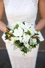 Gardenia wedding bouquets gardenia bouquet wedding flowers gardenias magnolia wedding magnolia flower purple calla lilies calla lily wedding pins. 10 Ways To Incorporate Gardenias Into Your Wedding Southern Living