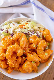 Dynamite Shrimp Made With Battered Fried Shrimp Coated In A Spicy Mayo Sauce Is The Perfect Recipe To Serve As An Appetizer Dynamite Shrimp Shrimp Dinner Food