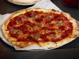 9 Best Pizzas From Diners Drive Ins And Dives Food Network Food Network Recipes Good Pizza Food