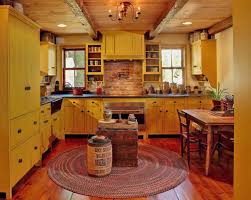 Paint your walls a deep gold shade to compliment wooden cabinetry or ceilings. 33 Amazing Country Chic Kitchens Brimming With Character Country Kitchen Designs Country Chic Kitchen Primitive Kitchen Cabinets