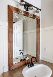 How do you mount a bathroom mirror? How To Add A Diy Wood Frame To A Bathroom Mirror