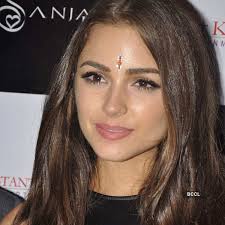 Miss Universe 2012 Olivia Frances Culpo at a party thrown for her in  Mumbai,