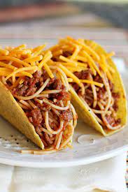 Stir in taco seasoning, rotel tomatoes, and spaghetti sauce. Spaghetti Tacos Jw Illustrations Taco Spaghetti Food Cooking Recipes