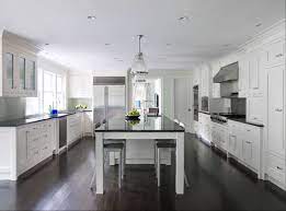 Even contemporary kitchens can look amazing with dark hardwood floors, and this one takes it a step further by including cabinets that are dark as well. White Kitchen Cabinets Dark Wood Floors Transitional Kitchen Alisberg Parker Architects