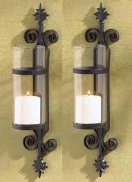 Shelving solution wall sconce candle holder metal wall decorations for living of. Robot Check Wall Candle Holders Wall Mounted Candle Holders Candle Holders Wall Decor