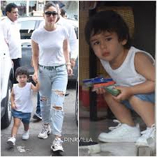 Kareena Kapoor Khan Looks Super Stylish In A White Top And Ripped Denim But Taimur Ali Khan Surely Ste Kareena Kapoor Khan Kareena Kapoor Bollywood Celebrities