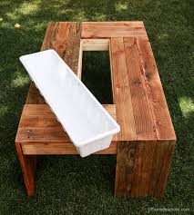 Coffee tables made from reclaimed pallets, because we all needs a coffee table. Remodelaholic Diy Outdoor Pallet Coffee Table With Drink Cooler