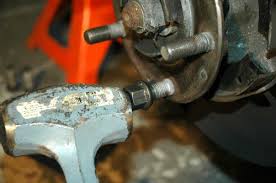 Take the new wheel stud and feed it through from the back of the hole in the hub. How To Replace A Stripped Wheel Stud