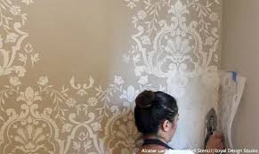 Wall board consists of a layer of gypsum sandwiched between paper outer surfaces, and. How To Stencil Diy Embossed Wall Designs With Joint Compound Plaster Royal Design Studio Stencils