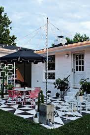 Create Outdoor Patio Lighting Without A Pergola Renter Friendly A Beautiful Mess Canopy Outdoor Patio Lighting Outdoor Patio Lights