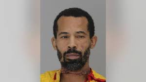Mugshot released of Dallas kidnapping suspect who slit throat when police  tried to arrest him