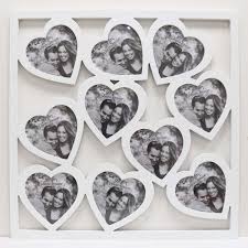 Just upload the photos to the layout, swap them if necessary, adjust the color of the border or add a background, also optionally you can add text or clipart to the collage. Heart Collage Picture Frame Harry Corry Limited