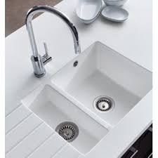 Baking soda is a popular alkalizing cleansing agent that can break up the bonds causing the stain on the surface of your sink. Encore White Acrylic 1 5 Bowl Sink In White Finish Modern Kitchen Sinks Best Kitchen Sinks Kitchen Sink Design