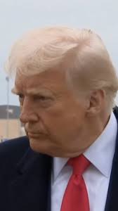 Trump Hit In Face With Microphone