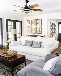 Black Windows And Doors Bring Drama To This Cozy Living Room Vintage Prints Giv Farm House Living Room Modern Farmhouse Living Room French Country Living Room