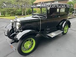Image result for Scaraba Green 1930 Oldsmobile