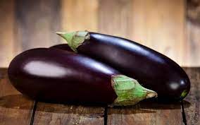 It may be preceded by the definite article la (the) or the indefinite. History Of Eggplant Melintzana The Greek Chef