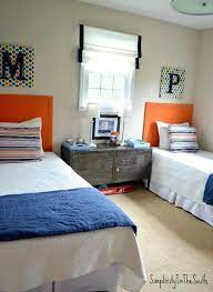 With so much packed into such a tight space, a small shared kids' room can be a recipe for frequent arguments. Room Reveal Our Two Youngest Boys Shared Bedroom Simplicity In The South