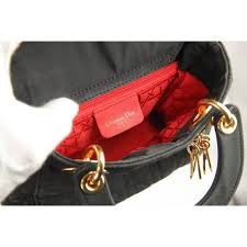 At the time, the brand's designs were a veritable ode to the glory of women, renewal and beauty. Christian Dior Black Cannage Quilted Canvas Mini Lady Dior Bag For Sale At 1stdibs