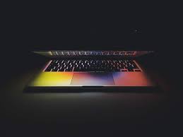 Hd Wallpaper Silver Macbook Pro Half Open While Turned On Silver And Black Laptop Wallpaper Flare