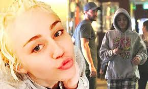 Miley Cyrus shows off her platinum blonde hair before going bowling with  Patrick Schwarzenegger