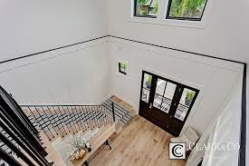 Clark Co Homes 2016 Spring Parade Home The Heartland Modern Farmhouse Www Clarkandcohomes Com Two Story Entryway Foyer Whit Home Builders Custom Home Builders Foyer Decorating