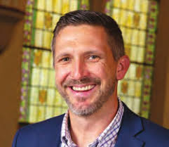 THEY TRUSTED HIM WITH THEIR STORIES Curtis Lawrence '80 received a Lifetime  Achievement Award in honor of his 44-year career