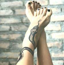Beautifully Detailed Snake Tattoo Wrapped Around The Ankle And Drawn Down The To Ankle Beautifully D Wrap Around Ankle Tattoos Snake Tattoo Foot Tattoos