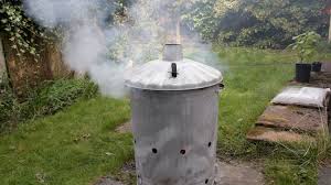 Domestic Incinerator Burning Garden Waste Producing Moderate Smoke Stock Footage Garden Waste Burning Domestic Domestic Garden Stock Footage