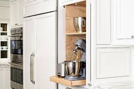 7 Tips For Creating The Perfect Minimalist Kitchen Hide Away Appliances Kitchen Hacks Design Minimalist Kitchen White Kitchen Appliances