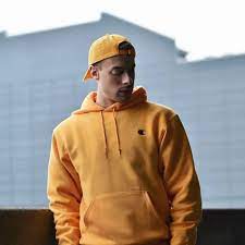 Photographer Bryanmundjr Mens Fashion Urban Outfitters Yellow Marigold Champion Hoodie Dad Cap Outfit Inspiration Cap Outfit Men Hat Men Outfit Cap Outfit