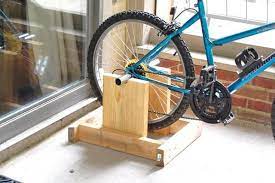 You might have spent a small fortune on your bike and want to ride it whenever possible. Ready To Roll Diy Ideas For Making Your Own Bike Stand Diy Home Gym Bike Stand Diy Gym Equipment