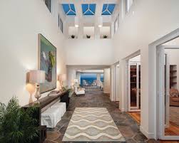 Peacock feather motifs delight and create a unique composition in the decor. Laguna Beach Home Staging Transitional Entry Orange County By Tiffany Hunter Home Houzz