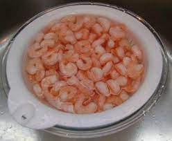 Lift the colander with the shrimp out of the bowl. How To Thaw Frozen Shrimp Fast Melanie Cooks
