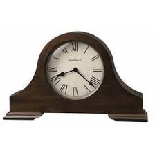 635 143 Howard Miller Mantel Clocks Humphrey The Aged Dial Of This Tambour Style Mantel Clock Features Roman Numerals And Sp Mantel Clock Mantel Clocks Clock