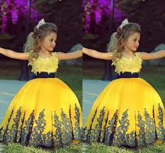 Black And Yellow Outfits For Kids 2015 Fashionable Yellow Ball Gown Girl Toddler Pageant Dresses With Black Sash Lace Applique Custom Toddler Pageant Dresses Flower Girl Dresses Pageant Dresses