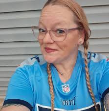 What was spat out from under the lawn mower?