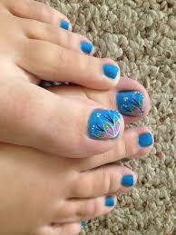 A cute and colorful flower inspired toenail art design. Cute Toenail Design How You Can Do It At Home Pictures Designs Cute Toenail Design For You The Nail For You