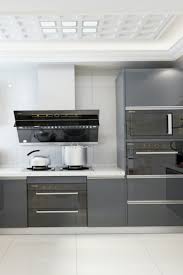 Solid wood is a classic. Pvc Board Kitchen Cabinets Kitchen Cabinets Wooden Kitchen Cabinets Kitchen