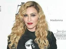 Madonna has stunned in a series of new selfies wearing a leather bra and matching short shorts, along with layered gold necklaces. Madonna Net Worth 2021 Madonna Biography Income Songs