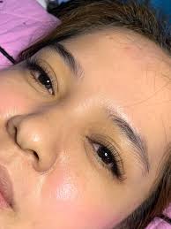 EYELASH EXTENSIONS AND EYEBROW LAMINATION.