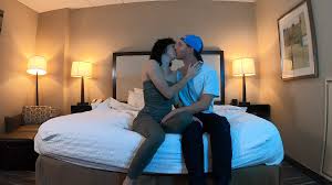 Romantic partners embracing in a warm interior - pure romance