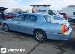 Image result for Light Ice Blue 2010 Town Car