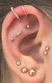 gold cartilage ear piercing ideas multiple combinations tragus ear plugs hel cartil earings piercings ear piercings ear jewelry